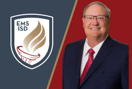  A man smiling with a maroon background behind him and the EMS ISD logo to his right